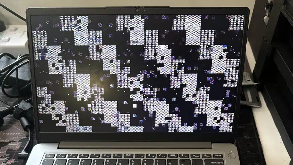 Close up of technician hands performing delicate laptop hardware repair at Fix My Laptop.